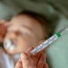 <i class="tbold">high fever</i>