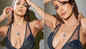 Malaika Arora stuns fans in plunging neckline gown with thigh-high slit; netizen writes, 'Ranveer Singh ka competition'