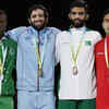 Gold medalist Ravi Kumar with fellow medalists