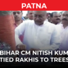 Article image for: Bihar: CM Nitish Kumar ties rakhis to <i class="tbold">trees</i> on the occasion of Raksha Bandhan