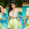 Article image for: <i class="tbold">mouni</i> Roy flaunts her curves in these poolside pictures, fans say 'koi itna hot kaise ho sakta'