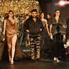 Walking the ramp in all-black look
