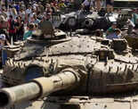 People visit an exhibition of destroyed Russian military vehicles and weapons, dedicated to the upcoming country's Independence Day, amid Russia's attack on Ukraine, in the centre of Kyiv, Ukraine.
