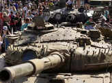 People visit an exhibition of destroyed Russian military vehicles and weapons, dedicated to the upcoming country's Independence Day, amid Russia's attack on Ukraine, in the centre of Kyiv, Ukraine.