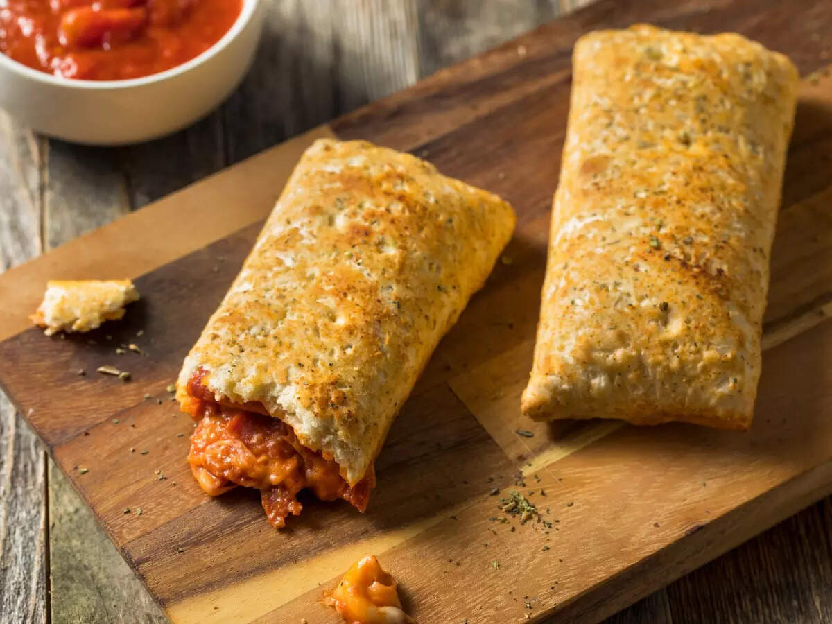 Bread Pizza Pocket Recipe: How to make Bread Pizza Pocket Recipe at Home |  Homemade Bread Pizza Pocket Recipe - Times Food