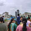 Residents on Parsvnath Prestige tower J 1 on top floor to view the demolition