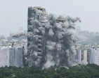 Plumes of dust as India demolishes illegal skyscrapers