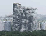 Plumes of dust as India demolishes illegal skyscrapers