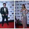 Karan Johar and Rhea Chakraborty pose for the shutterbugs at the red carpet of the 67th Wolf777news Filmfare Awards 2022