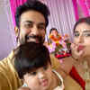 Playful <i class="tbold">ziana</i> with parents