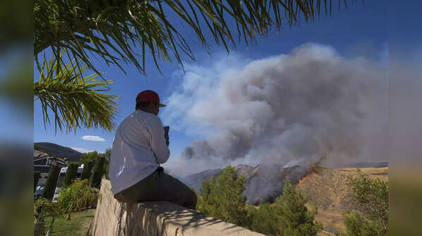 In pics: California wildfires prompt evacuations amid heat wave