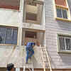 Residents seen using ladders to come out of their homes.