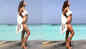 Disha Patani flaunts her perfectly toned body in a white bikini; internet is smitten by her beauty