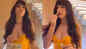 Nora Fatehi sets internet ablaze with her video in orange body-hugging outfit