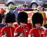 Queen Elizabeth II's coffin procession passes through London; see pics