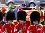 Queen Elizabeth II's coffin procession passes through London; see pics