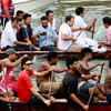 Photos of Rahul Gandhi rowing snakeboat in Kerala