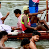 Photos of Rahul Gandhi rowing snakeboat in Kerala
