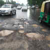 Very poor condition of road near DPS school Mathura road after the heavy rain in Delhi on Friday.