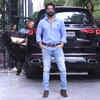 Article image for: Varun Dhawan looks dashing in a shirt and jeans, pairs them with brown boots and sunglasses