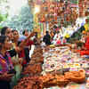 Article image for: Patna: Women buy decorated earthen lamps from a shop ahead of Diwali festival, in Patna on Wednesday, Oct. 19, 2022. (Photo: IANS)