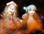 Revelers around the world dress up for Halloween; see pics
