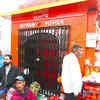 Devotees arrive to offer prayers as a temple closed due to the Lunar Eclipse, in Haridwar