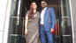 Childhood friends Ajay Devgn looks handsome in a blue suit whereas Tabu makes heads turn in a black and gold saree