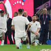 Lionel Messi (R) and his teammates warm up before the Qatar 2022 World Cup semi-final match between Argentina and Croatia at Lusail Stadium.