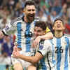 Pic: Argentina's Julian Alvarez celebrates scoring their second goal with Lionel Messi and Nahuel Molina
