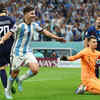 Pic: Argentina's Julian Alvarez celebrates scoring their third goal as Croatia's Dominik Livakovic reacts.