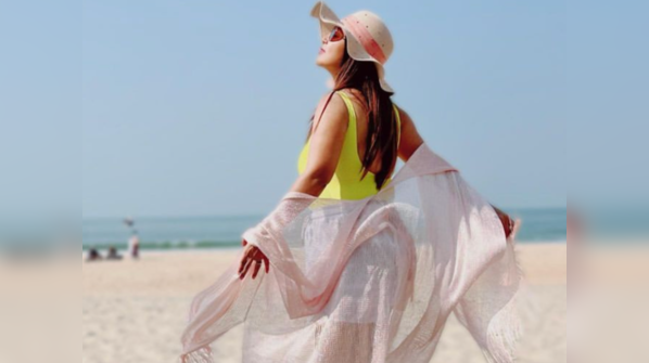 New mom Debina Bonnerjee shines in a yellow bikini in Goa