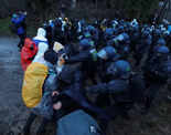 In Pictures: Police move on coal mine protesters barricaded in abandoned German village