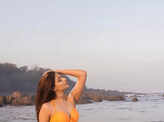 Actor Nikkita Ghag flaunts an orange bikini, & says "Colors are not associated with any religion."
