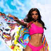 Divita Rai oozes oodles of oomph in fuchsia bikini