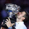 Article image for: Djokovic wins Australian Open to equal Nadal's 22 <i class="tbold">grand slam titles</i>