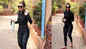 Malaika Arora flaunts her slim figure in black zipped crop top and high-waist leggings, completes her look with sunglasses