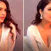 Article image for: Bhojpuri actress <i class="tbold">Neha Malik</i> poses in white dress with plunging neckline; fan writes, 'Looking gorgeous'