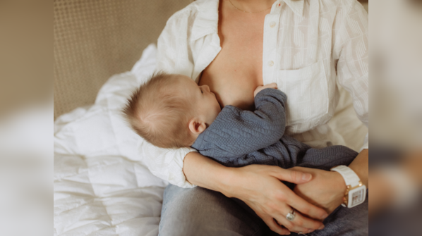 Let the child nibble on something before breastfeeding: