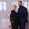 Article image for: English former football player and tv presenter Rio Ferdinand and his wife Kate Wright AFP