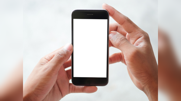 Holding phone with both hands and using only one thumb