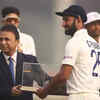 Sunil Gavaskar presents Cheteshwar Pujara with a cap for his 100th Test match
