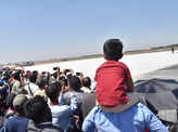 Children enjoy the display at the 14th edition of Aero India