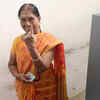 Erode East Bypoll: Modakkurichi BJP MLA C Saraswathi shows her index finger after franchised her voting right