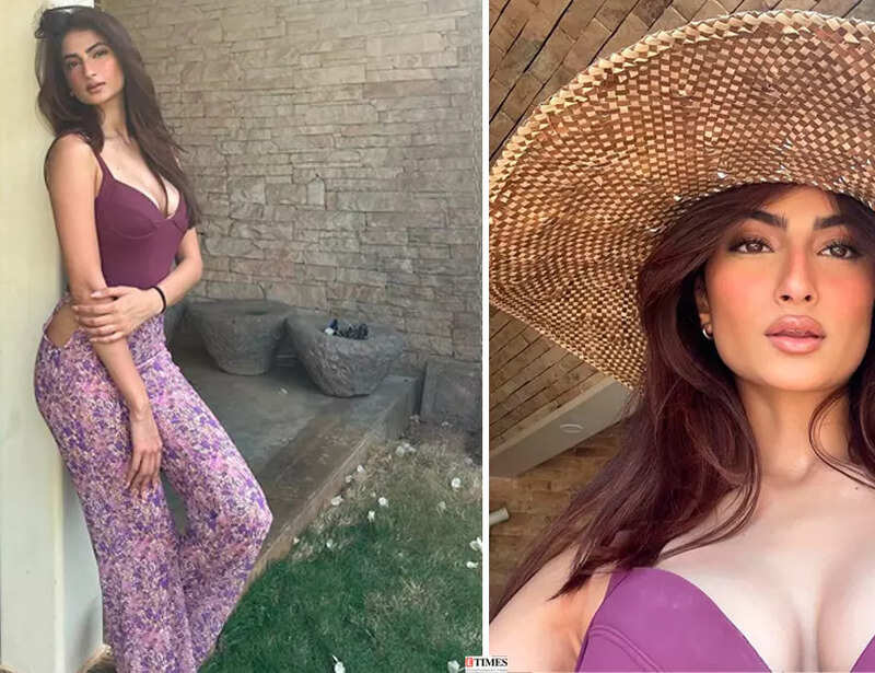 Palak Tiwari shares sun-kissed pictures in purple crop top and printed pants
