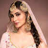 Article image for: Mouni Roy redefines charm and elegance in <i class="tbold">indian outfits</i>