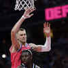 Article image for: Holiday <i class="tbold">leap</i>s past Porzingis