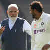 Prime Minister Narendra Modi walks out with India captain Rohit Sharma during day one of the fourth Test against Australia at Sardar Patel Stadium on March 09, 2023 in Ahmedabad.