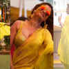 Article image for: Ankita Lokhande wears a yellow saree with deep-neck blouse, gets romantic with hubby Vicky Jain at <i class="tbold">holi bash</i>