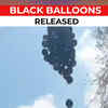 Article image for: OPS supporters release black balloons as a mark of protest against EPS in Tamil Nadu